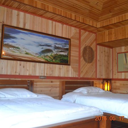 Longji Holiday Hotel لونغشينغ الغرفة الصورة