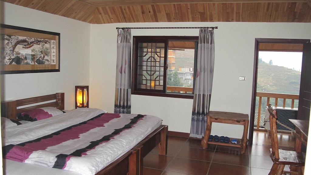 Longji Holiday Hotel لونغشينغ الغرفة الصورة