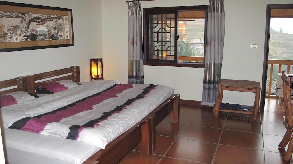 Longji Holiday Hotel لونغشينغ الغرفة الصورة