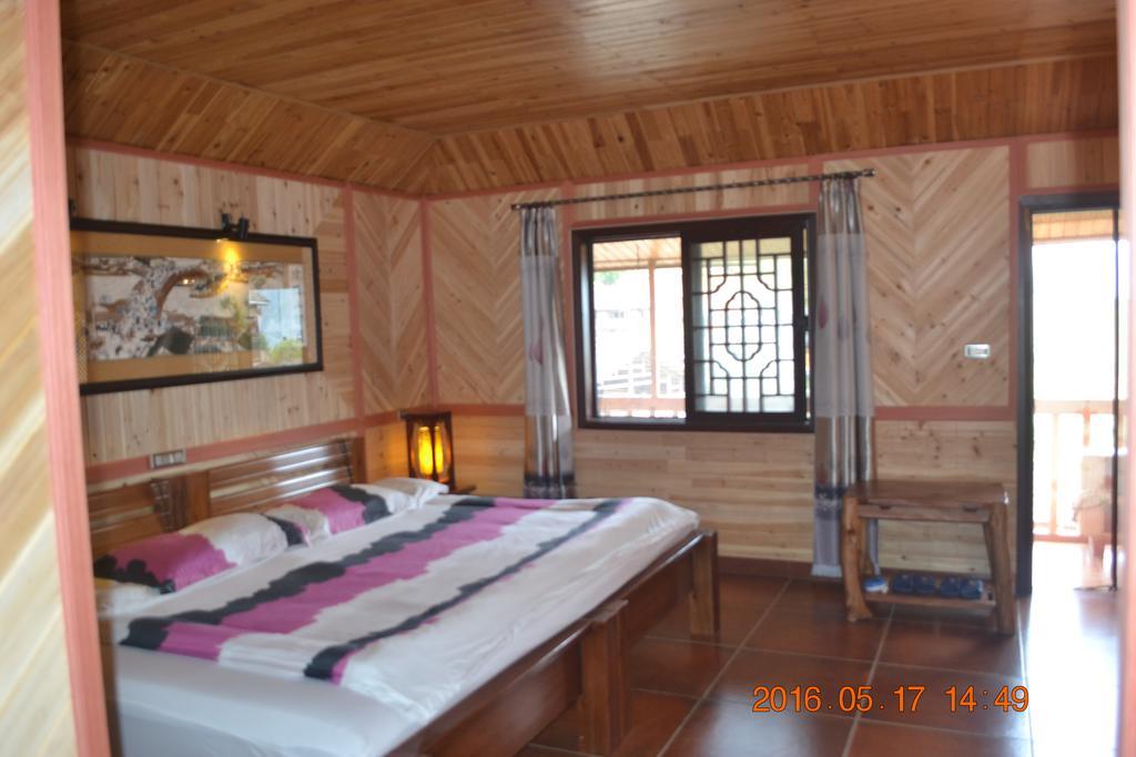 Longji Holiday Hotel لونغشينغ الغرفة الصورة